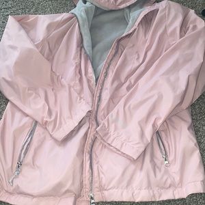Baby pink reversible rain jacket with a soft inside